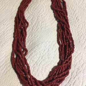 Sale5/$25 Costume jewelry. 10 strand red necklace.